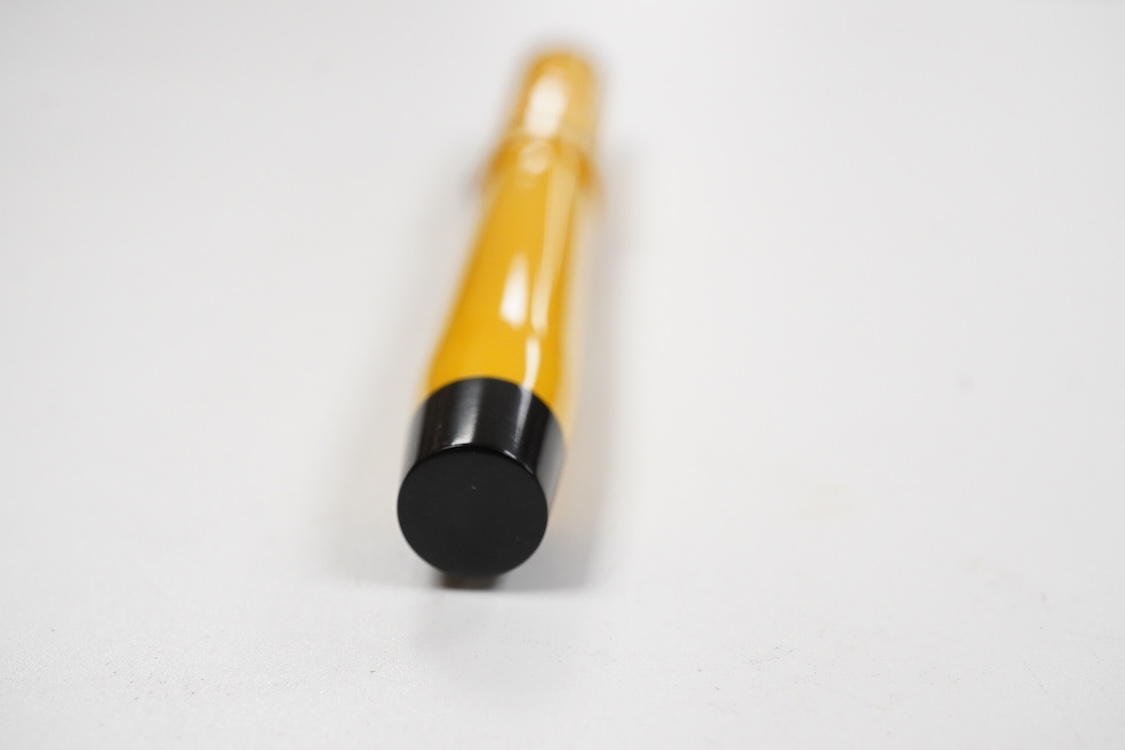 A Parker Lucky Curve Duofold Senior in mandarin yellow with 14ct Duofold nib